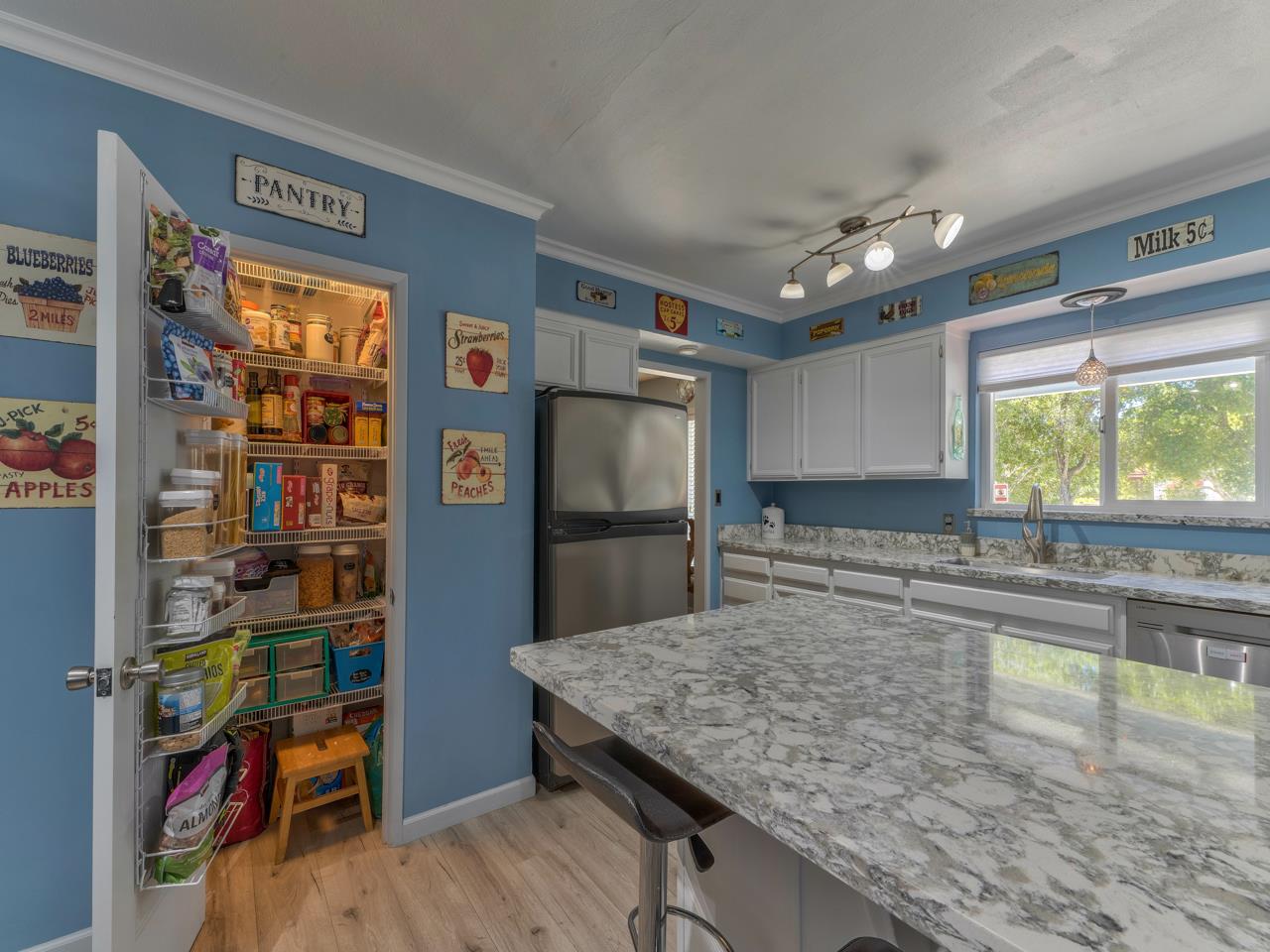 14 Vista Drive Prunedale, CA 93907 - Photo 9 of 31 a kitchen with stainless steel appliances granite countertop a refrigerator and a sink