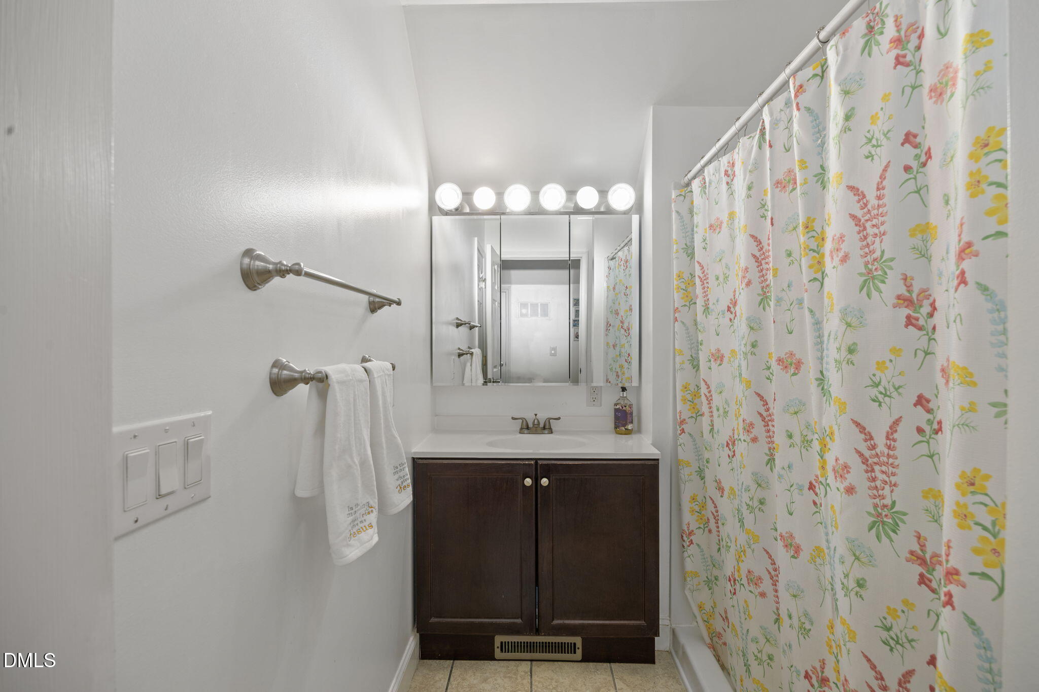 828 Chair Factory Road Nakina, NC 28455 - Photo 27 of 54 a bathroom with a double vanity sink and a mirror