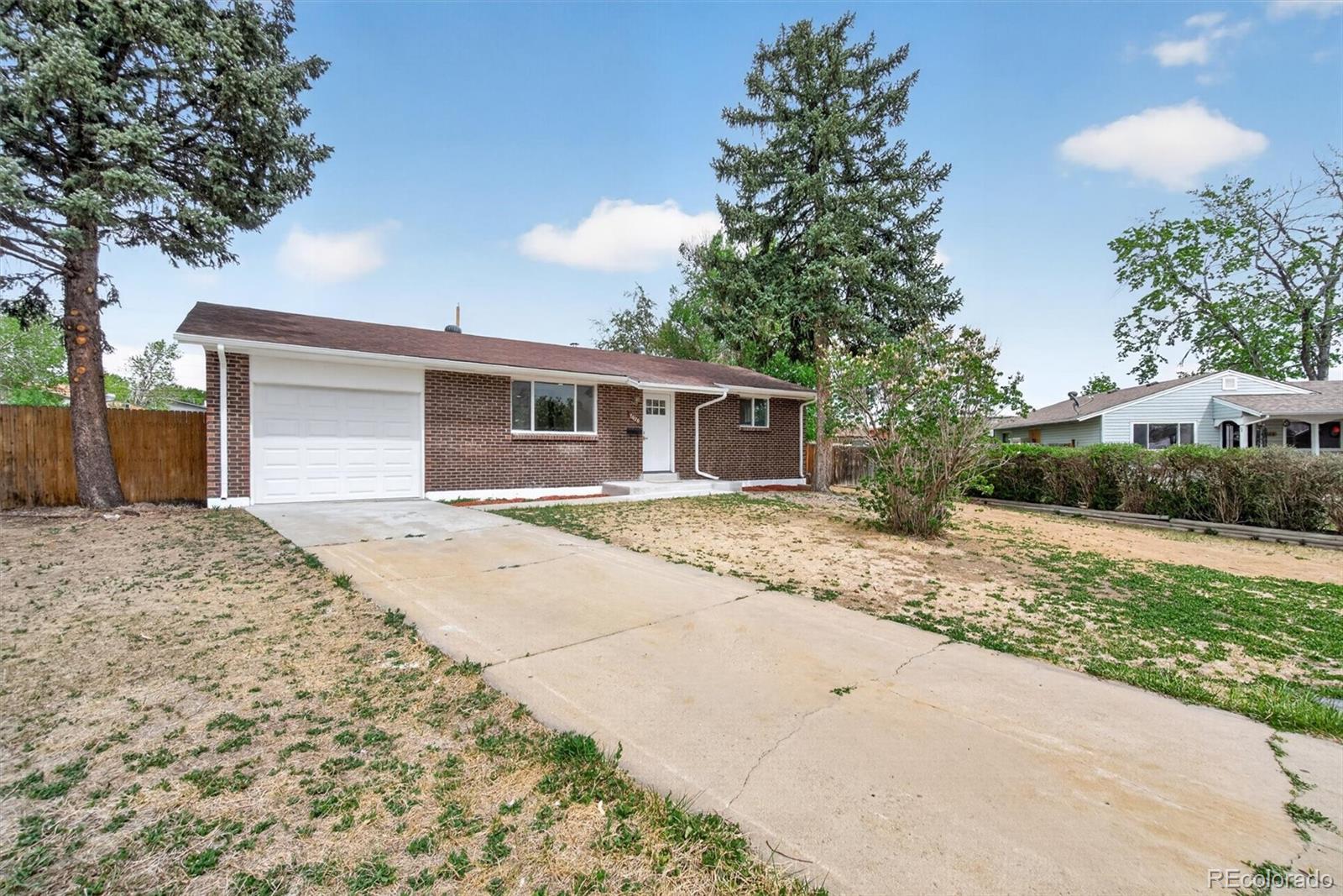 7620 Acoma Court Denver, CO 80221 - Photo 2 of 39 a front view of house with yard
