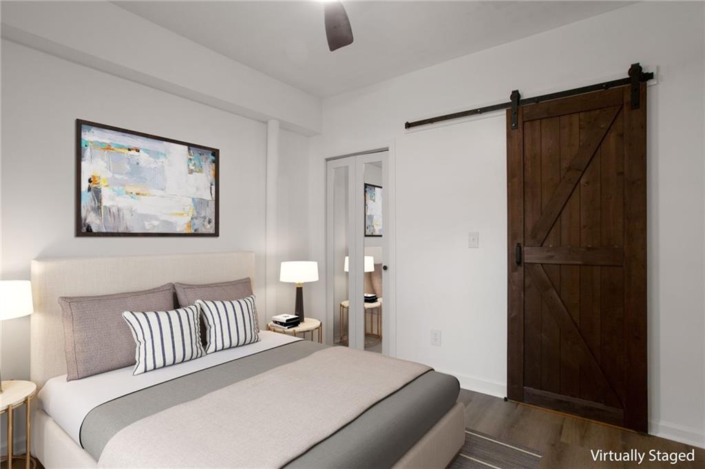 2326 Mark Trail Decatur, GA 30032 - Photo 12 of 19 a bedroom with a bed and a window