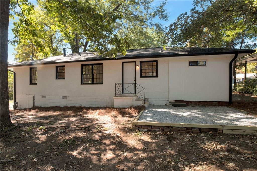 2326 Mark Trail Decatur, GA 30032 - Photo 18 of 19 a backyard of a house with lots of green space