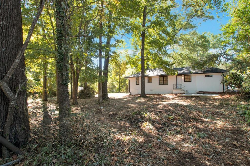 2326 Mark Trail Decatur, GA 30032 - Photo 19 of 19 a view of a house with a tree