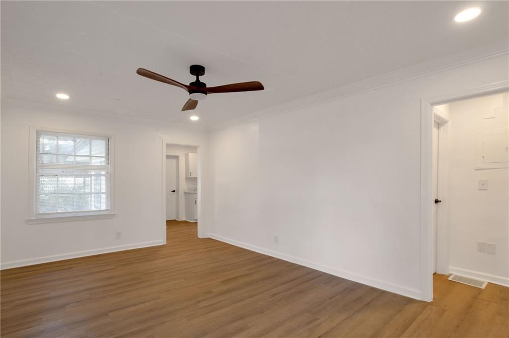 2326 Mark Trail Decatur, GA 30032 - Photo 5 of 19 wooden floor in an empty room with a window