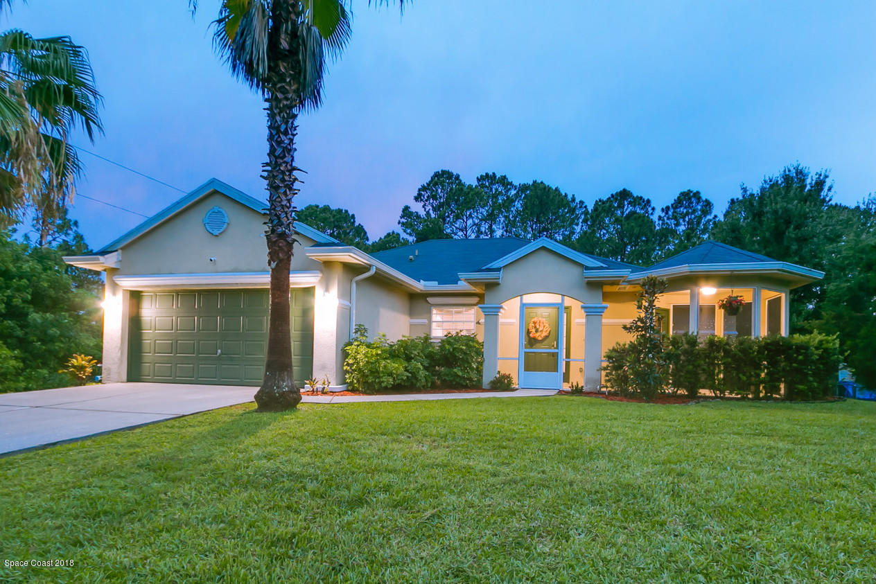 1542 Rainsville Road Southeast Palm Bay, FL 32909 - Photo 1 of 24 01_Rainsville4916_mls