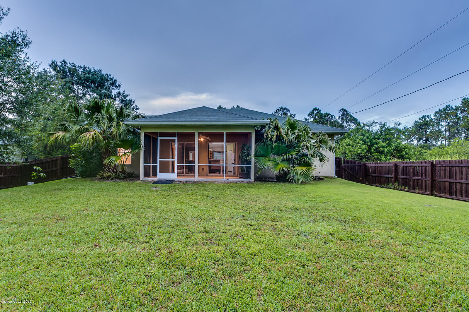 1542 Rainsville Road Southeast Palm Bay, FL 32909 - Photo 20 of 24 180 Backyard