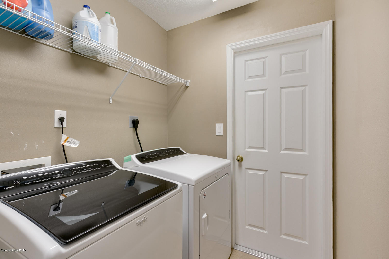 1542 Rainsville Road Southeast Palm Bay, FL 32909 - Photo 22 of 24 200 Laundry Room