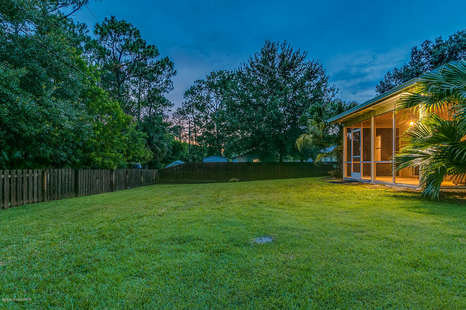 1542 Rainsville Road Southeast Palm Bay, FL 32909 - Photo 6 of 24 50 Backyard