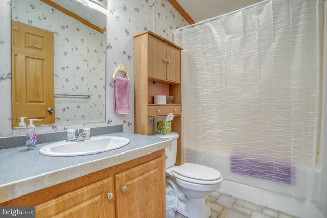 a bedroom with a bed and a cabinets