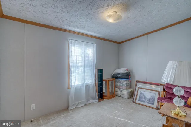 a view of storage and utility room with washer and dryer