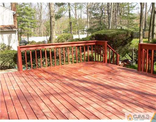 11 Pine Ridge Drive Edison, NJ 08820 - Photo 12 of 25 a view of a two chairs on the roof deck