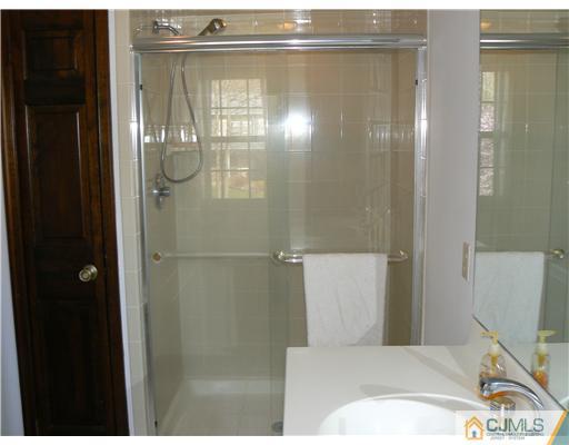 11 Pine Ridge Drive Edison, NJ 08820 - Photo 19 of 25 a bathroom with a shower