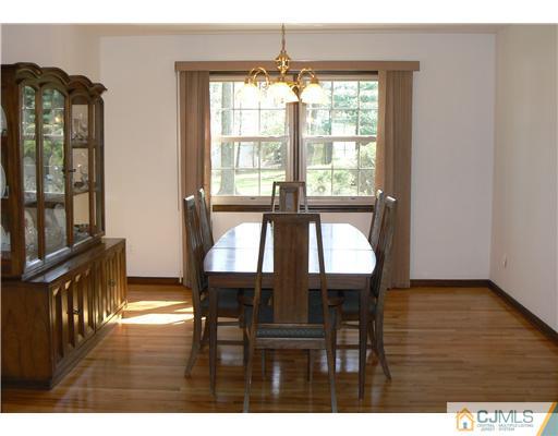 11 Pine Ridge Drive Edison, NJ 08820 - Photo 10 of 25 a view of a dining room with furniture and window