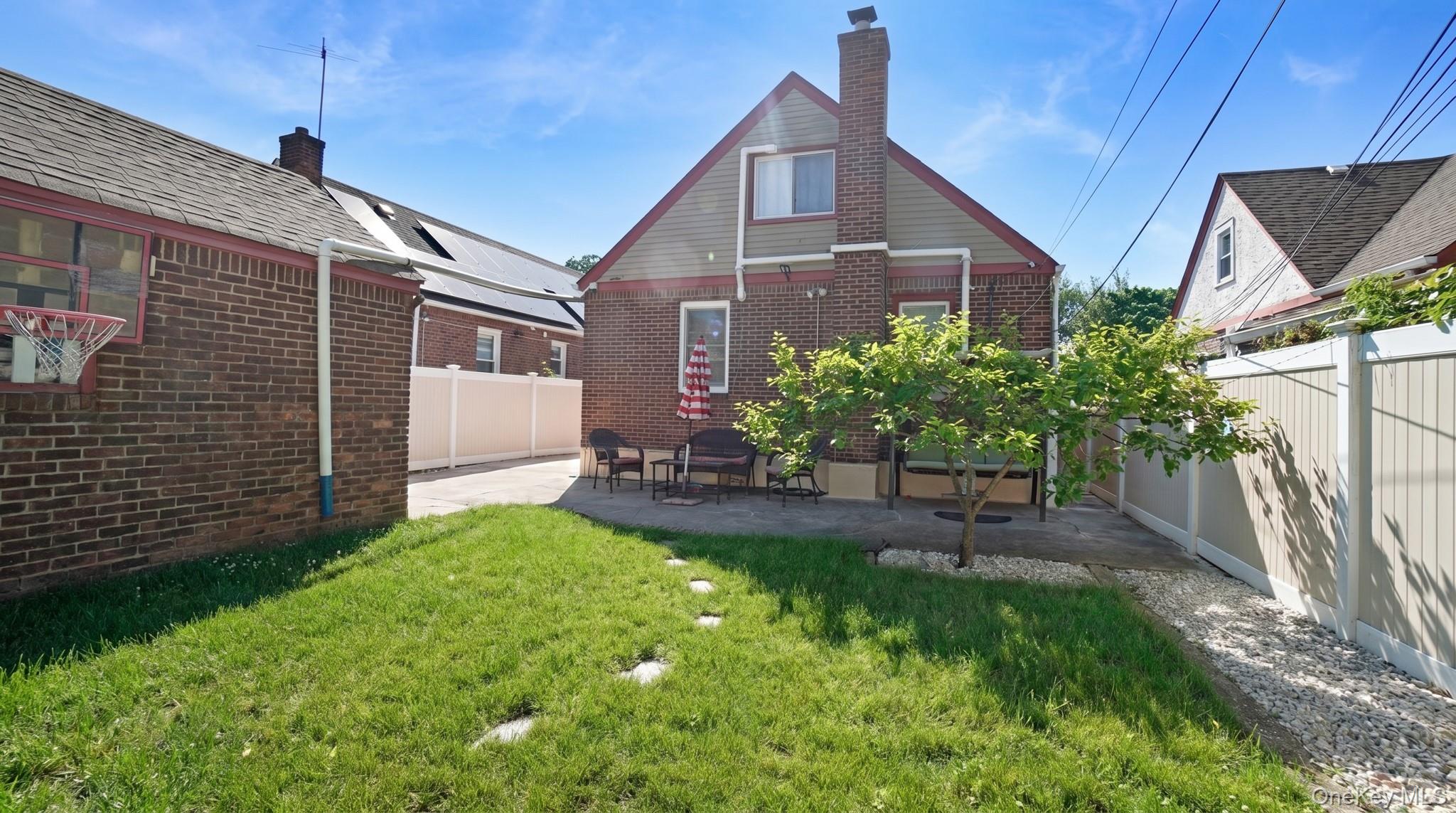 172-17 Amelia Road Queens, NY 11434 - Photo 18 of 18 a view of a house with a yard and plants