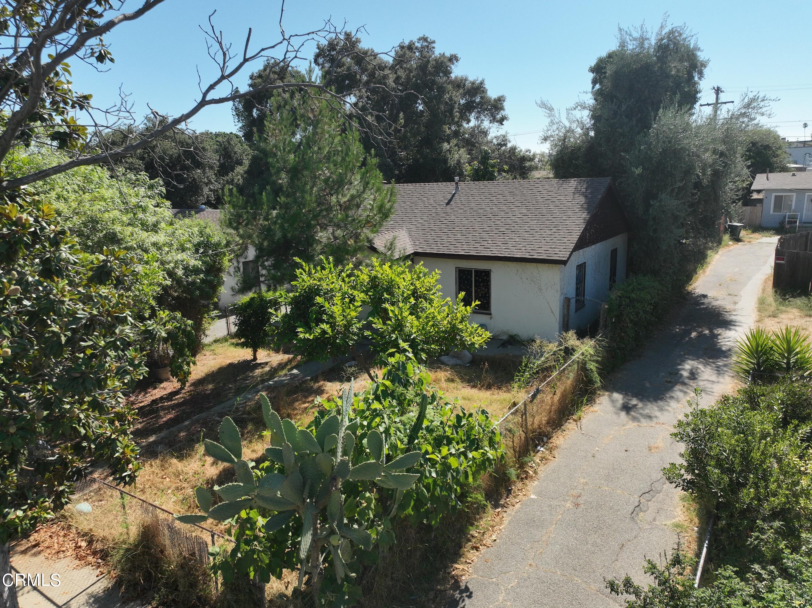 63 Eloise Avenue Pasadena, CA 91107 - Photo 5 of 5 a aerial view of a house with a yard and potted plants