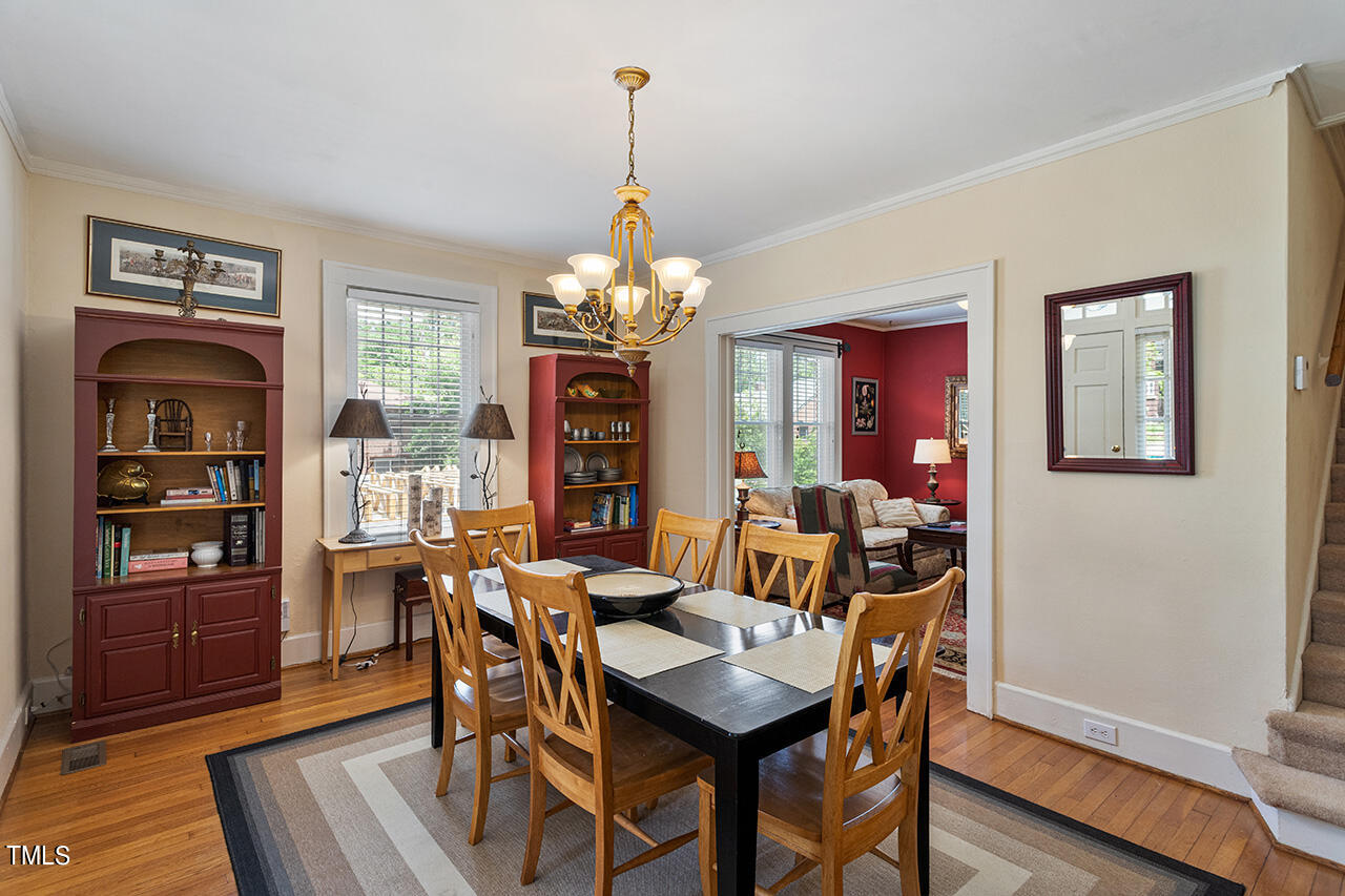 904 North Gregson Street Durham, NC 27701 - Photo 18 of 34 a view of a dining room with furniture and wooden floor