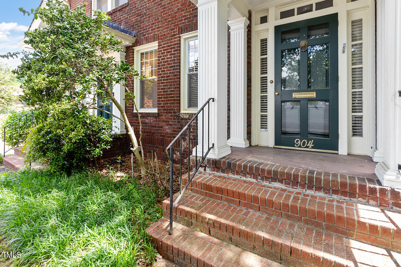 904 North Gregson Street Durham, NC 27701 - Photo 2 of 34 a view of a house with a door and wooden floor