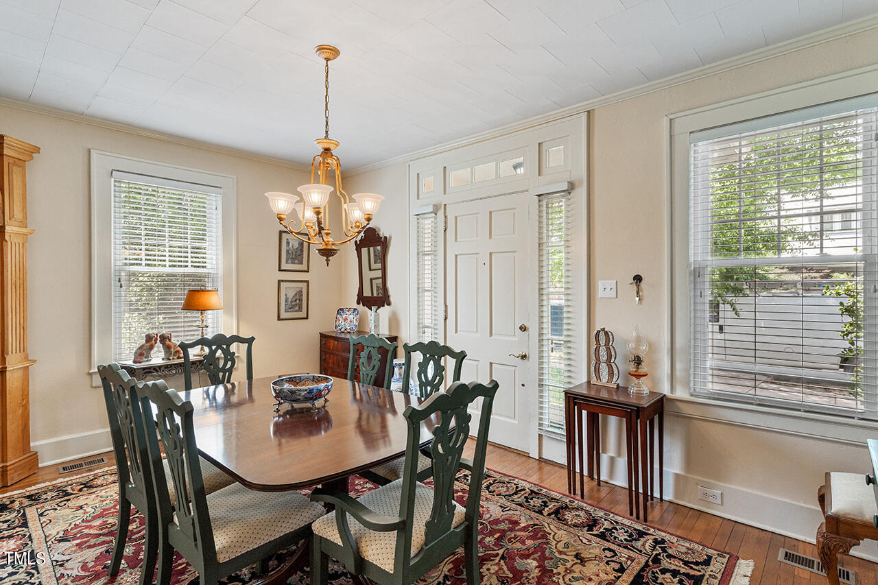 904 North Gregson Street Durham, NC 27701 - Photo 4 of 34 a view of a dining room with furniture window and outside view