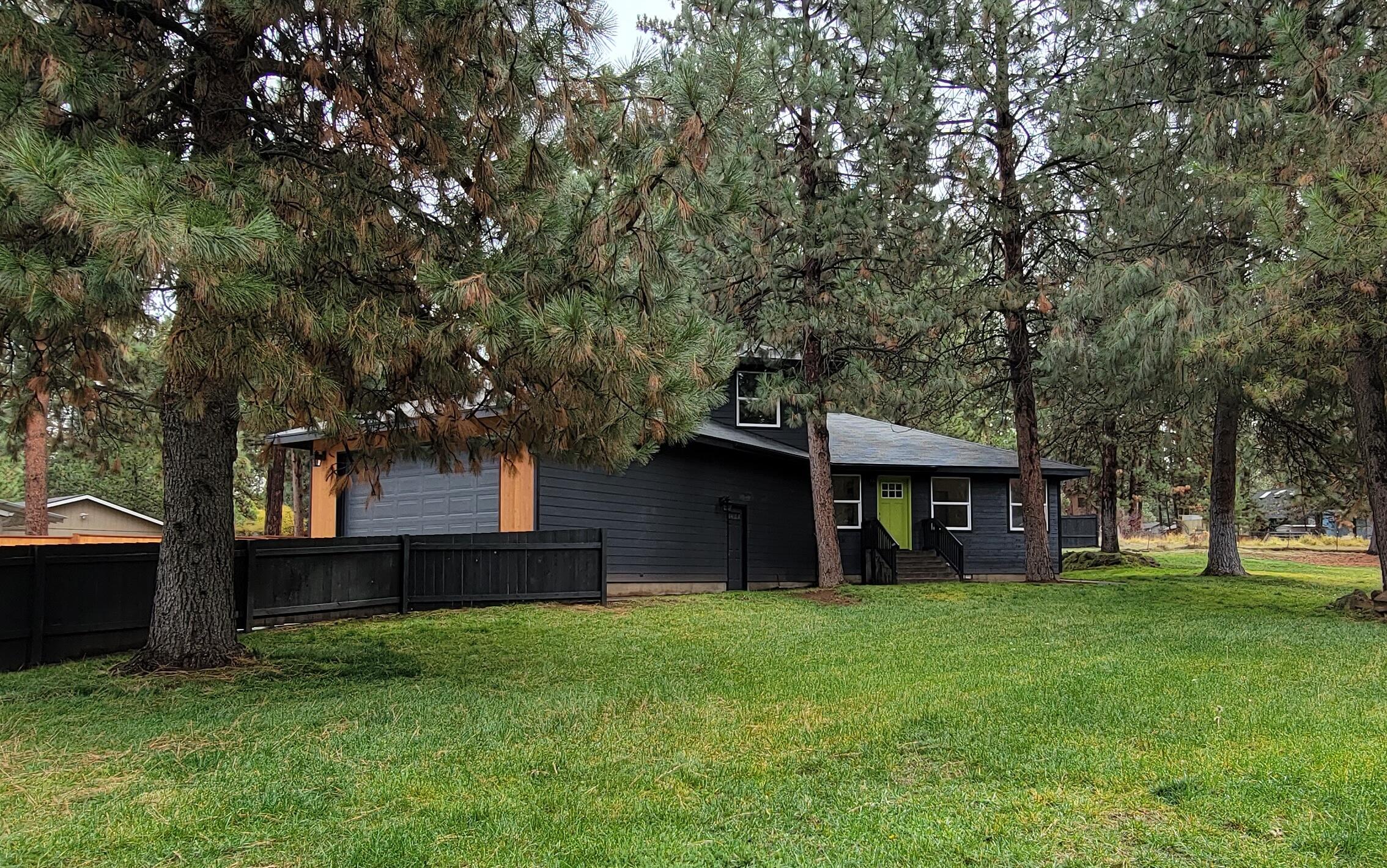 19263 Indian Summer Road Bend, OR 97702 - Photo 32 of 32 a view of a house with a backyard