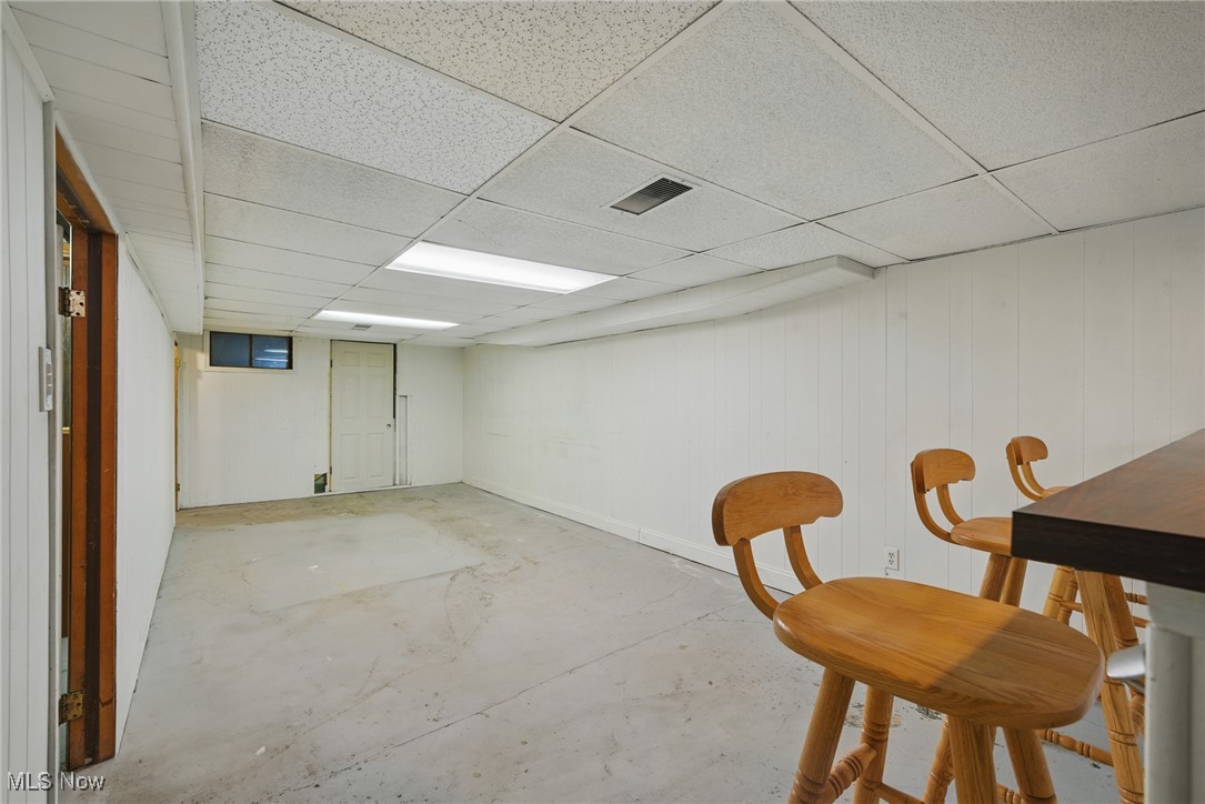28575 White Road Wickliffe, OH 44092 - Photo 35 of 49 Finished basement featuring a paneled ceiling and visible vents