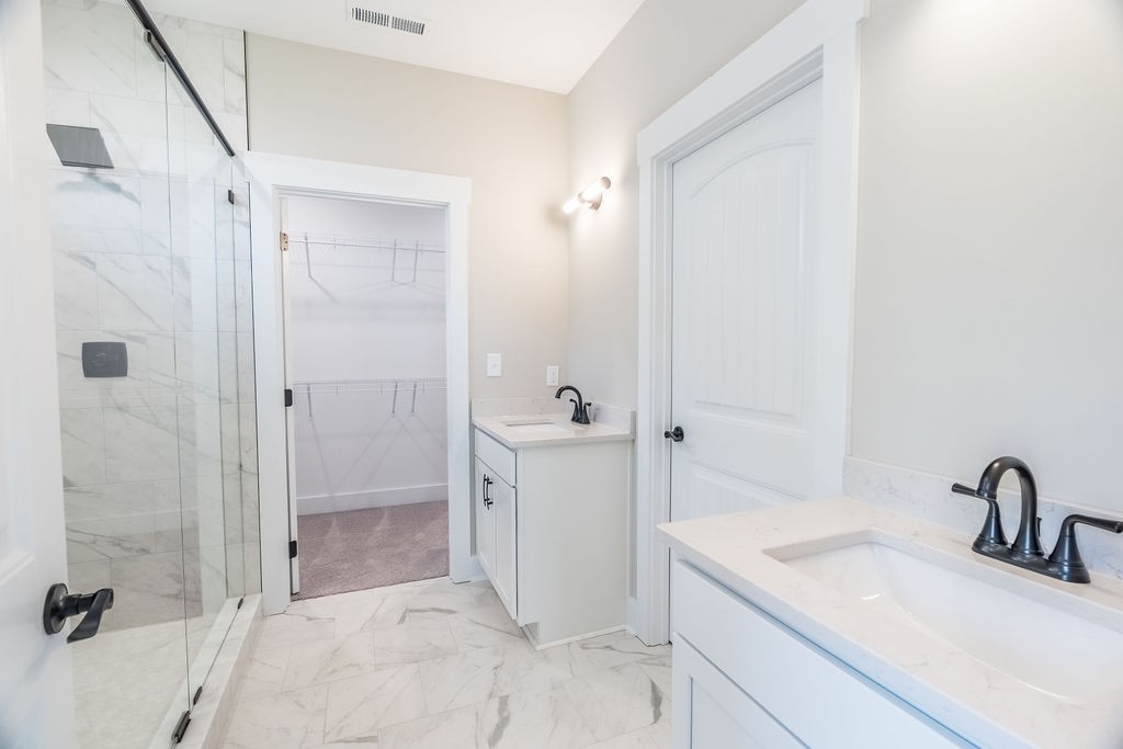 104 Bee Line Way Trenton, KY 42286 - Photo 13 of 23 a bathroom with a sink a toilet and shower