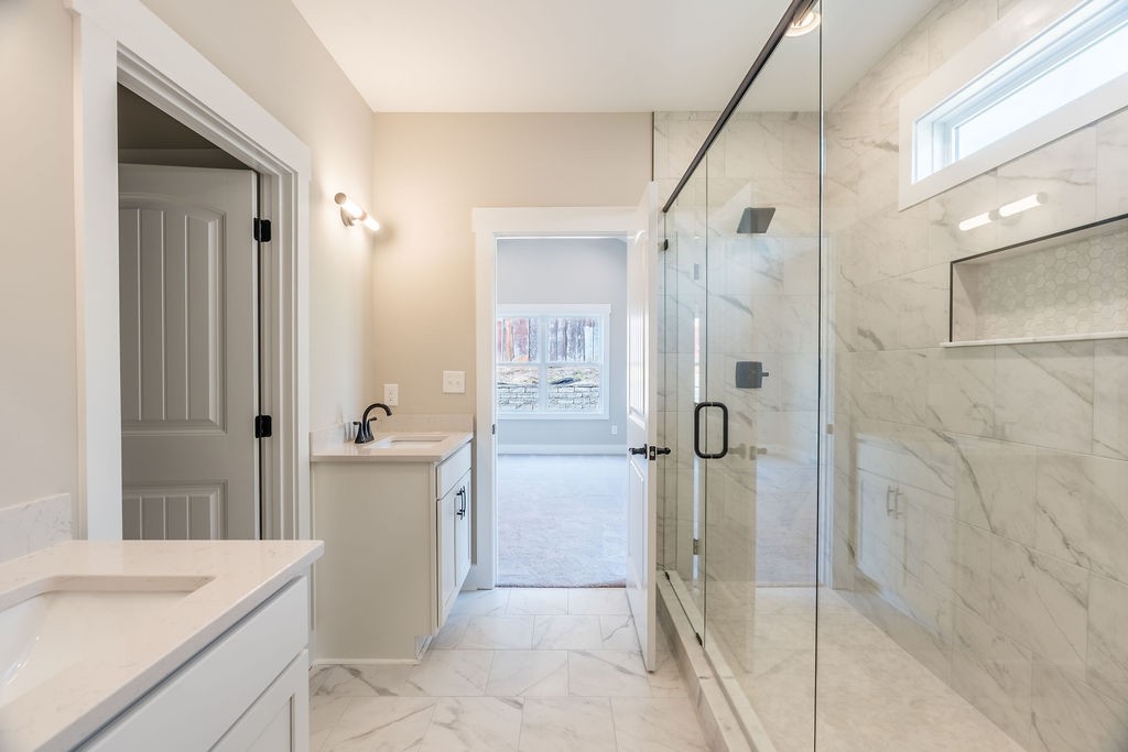 104 Bee Line Way Trenton, KY 42286 - Photo 15 of 23 a bathroom with a granite countertop shower mirror and a sink