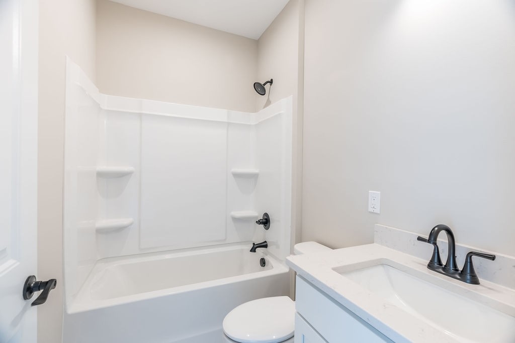 104 Bee Line Way Trenton, KY 42286 - Photo 19 of 23 a bathroom with a sink toilet and bathtub
