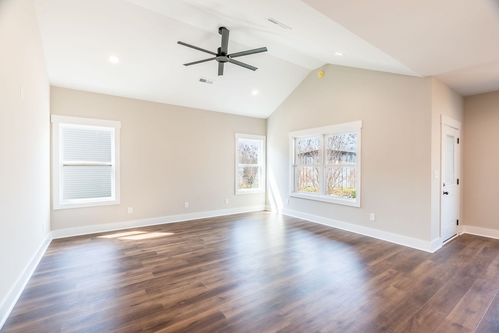104 Bee Line Way Trenton, KY 42286 - Photo 6 of 23 a view of an empty room with a window and wooden floor