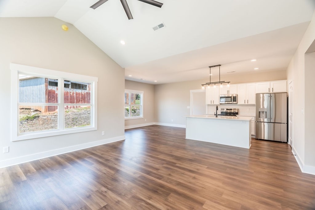 104 Bee Line Way Trenton, KY 42286 - Photo 7 of 23 a view of kitchen with wooden floor and electronic appliances