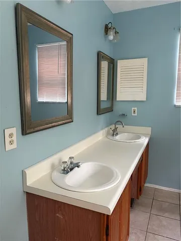 a bathroom with a bathtub and a sink