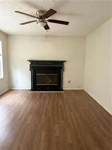 a view of an empty room with windows