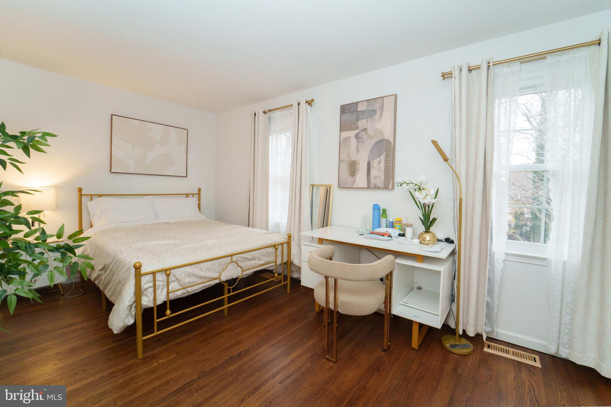 7625 Tiverton Drive, Unit 7625 Springfield, VA 22152 - Photo 15 of 22 a spacious bedroom with a bed and a window