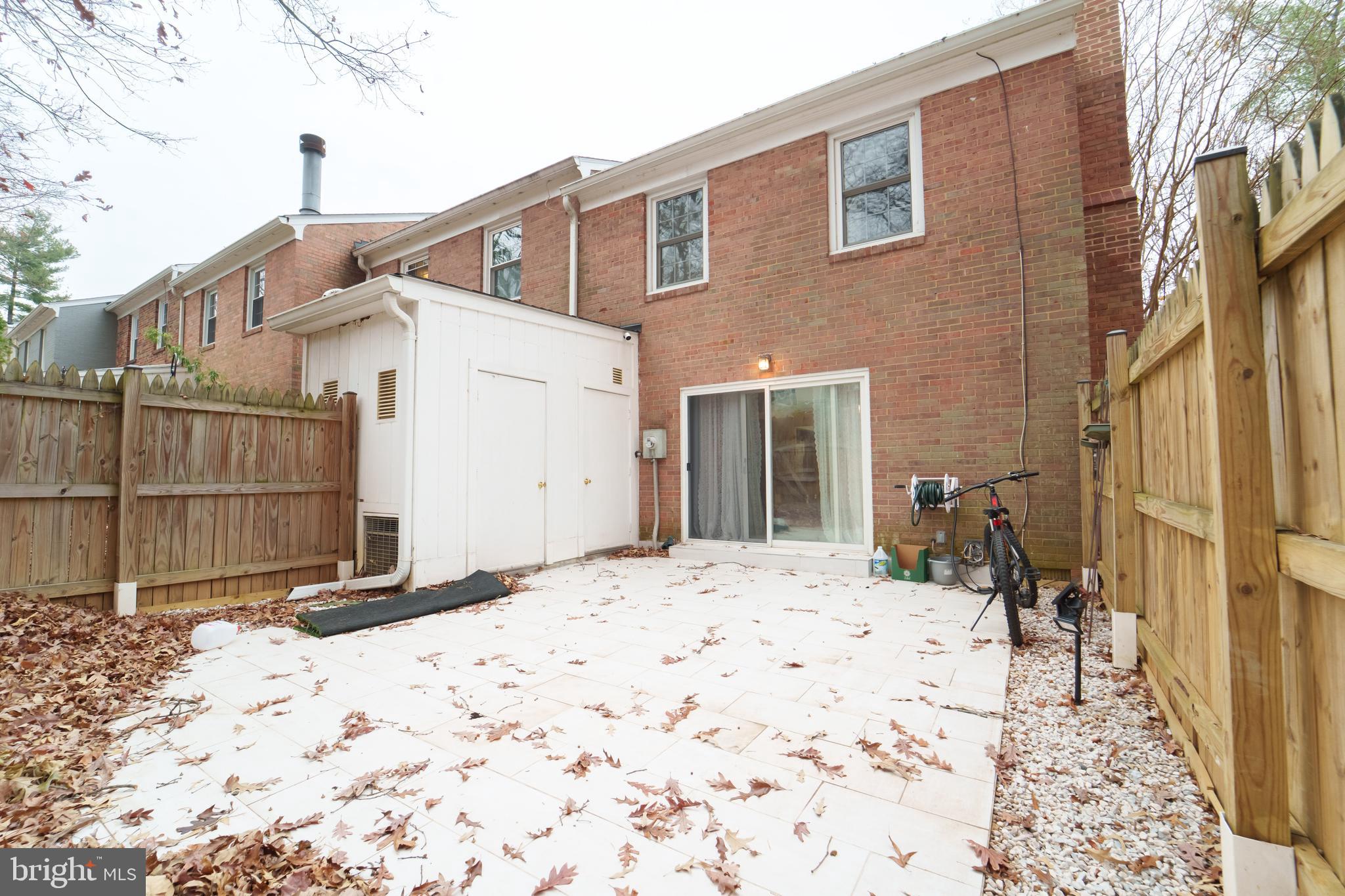 7625 Tiverton Drive, Unit 7625 Springfield, VA 22152 - Photo 18 of 22 a backyard of a house