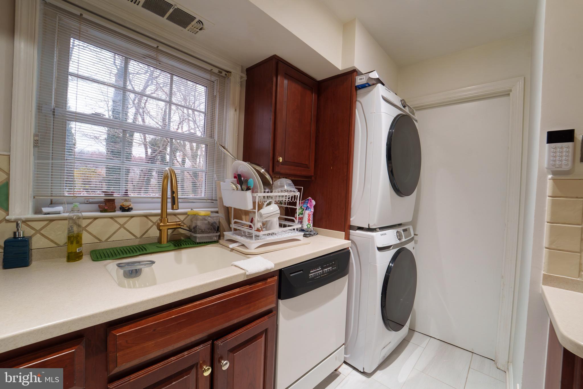 7625 Tiverton Drive, Unit 7625 Springfield, VA 22152 - Photo 7 of 22 a utility room with dryer and washer