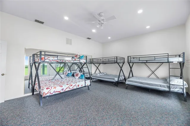 a bathroom with a sink toilet and a mirror