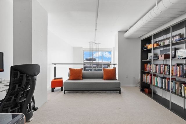 a view of workspace with lounge chair