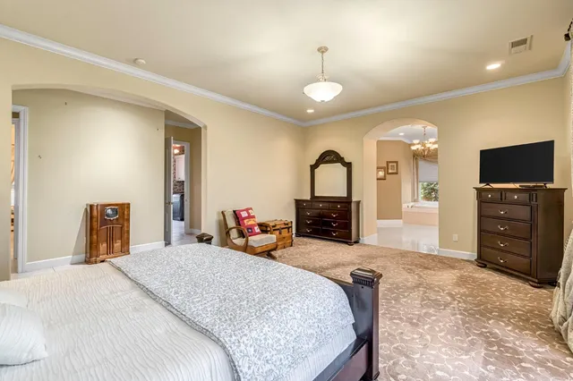 a bathroom with a sink a vanity and a mirror