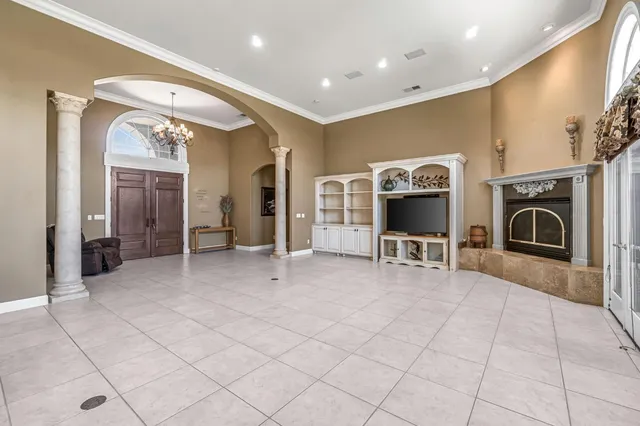 a view of a entryway door with living room