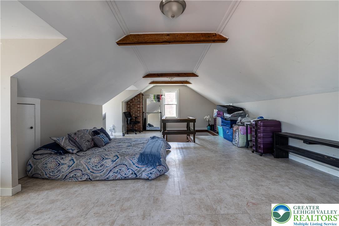 118 South 3rd Street Bangor, PA 18013 - Photo 22 of 33 This spacious attic room offers flexible living space with architectural details and ample natural light.