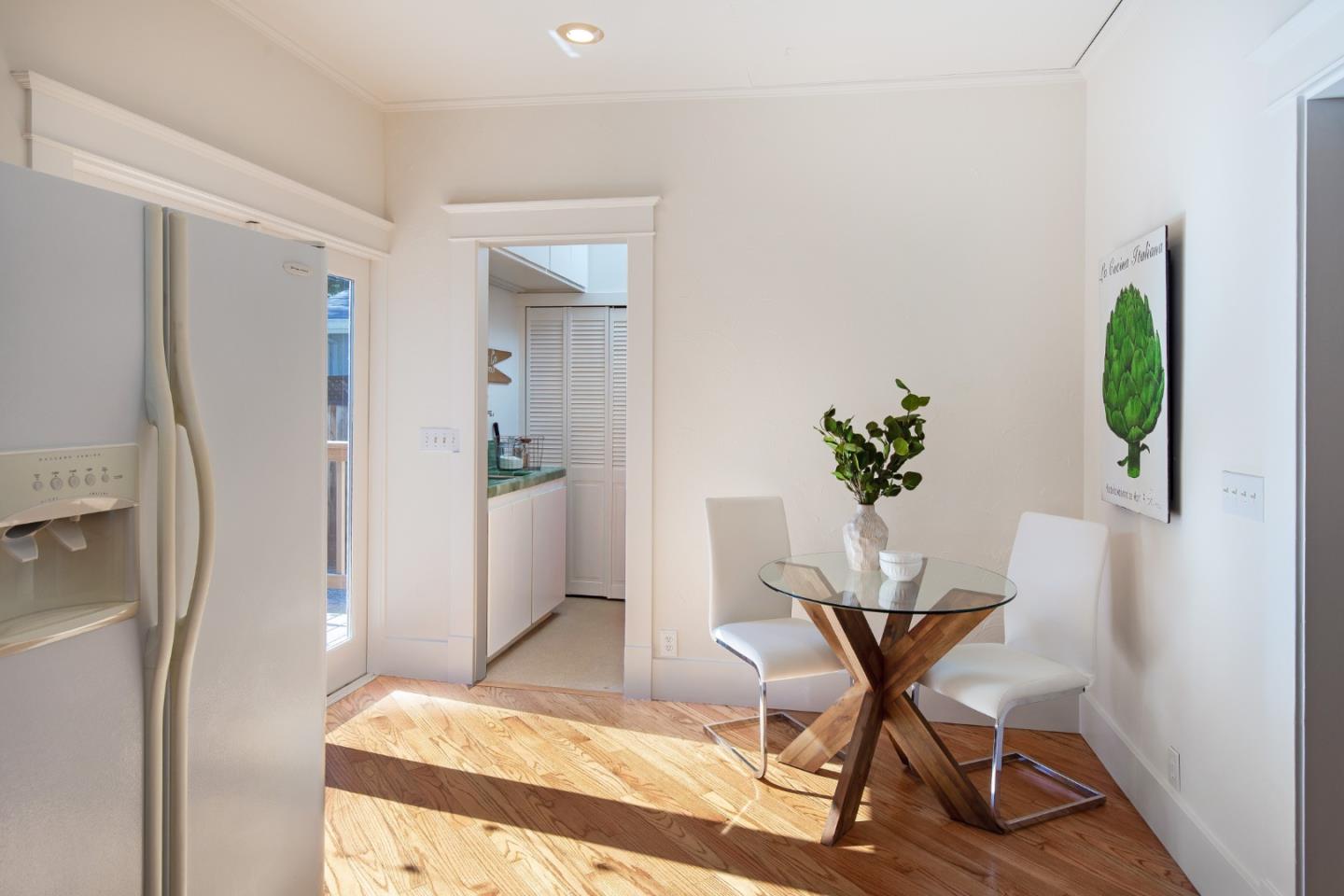417 Mountain View Avenue Mountain View, CA 94041 - Photo 12 of 22 a view of a dining room with furniture and a potted plant