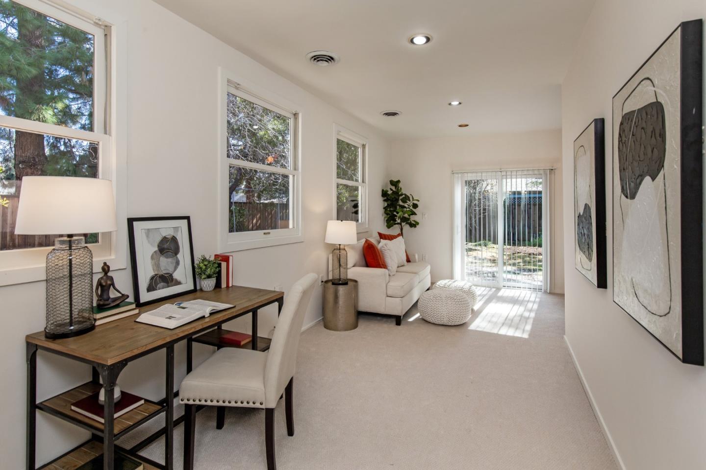 417 Mountain View Avenue Mountain View, CA 94041 - Photo 16 of 22 a living room with furniture and a large window
