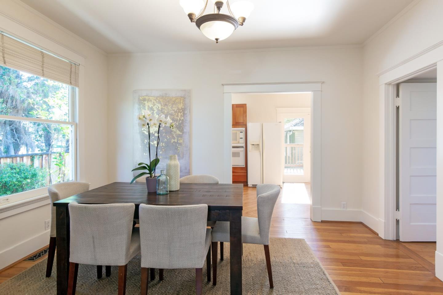 417 Mountain View Avenue Mountain View, CA 94041 - Photo 6 of 22 a view of a dining room with furniture window and outside view