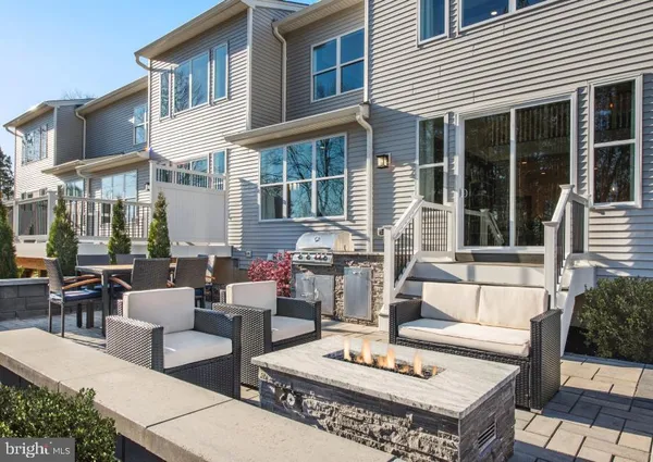 a building outdoor space with patio furniture