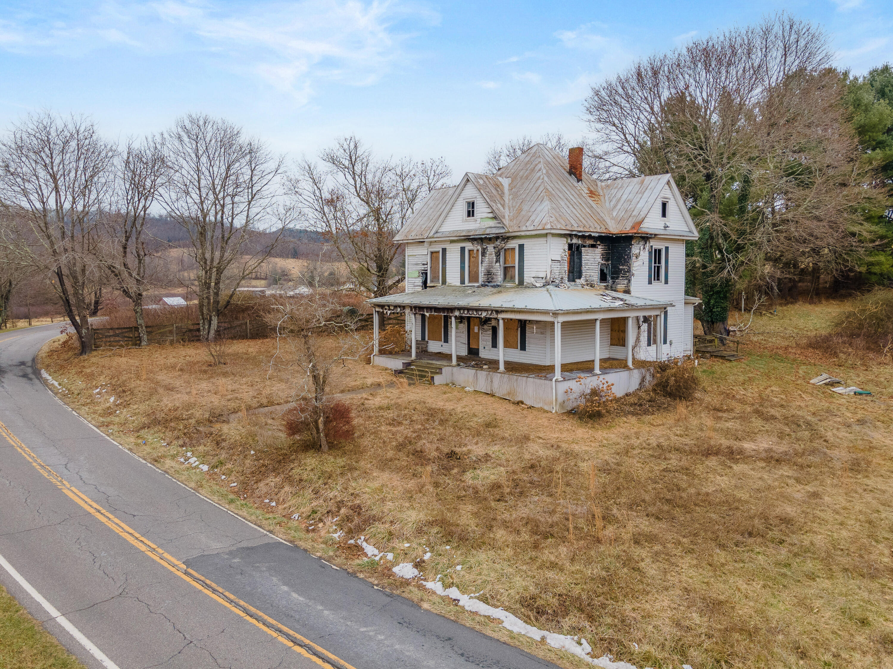 142 Conner Grove Road Southwest Willis, VA 24380 - Photo 13 of 33 a view of a house with a yard