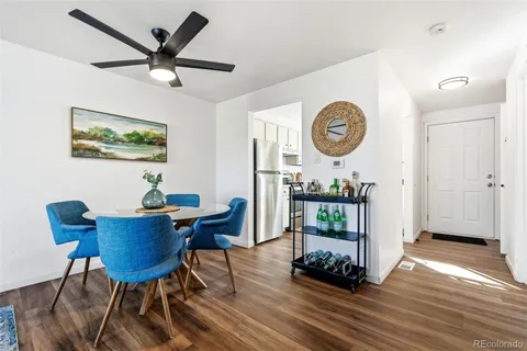 a living room with furniture and a table
