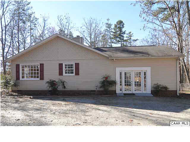 9057 Poindexter Road Louisa, VA 23093 - Photo 31 of 35 a front view of a house with a yard
