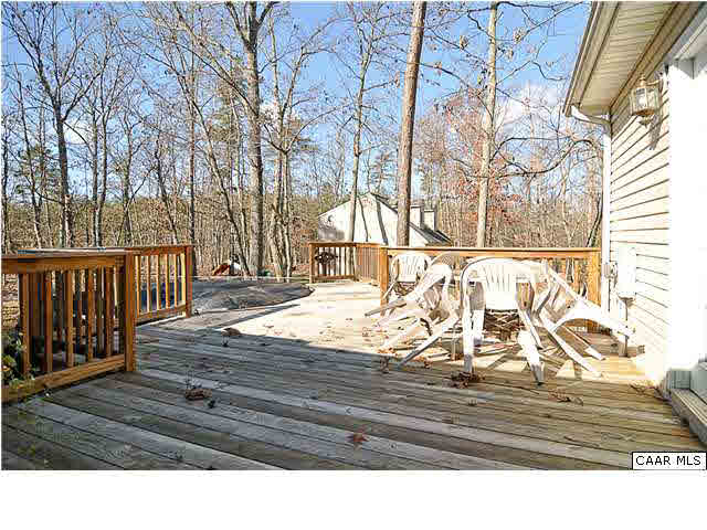 9057 Poindexter Road Louisa, VA 23093 - Photo 33 of 35 a view of a house with wooden fence