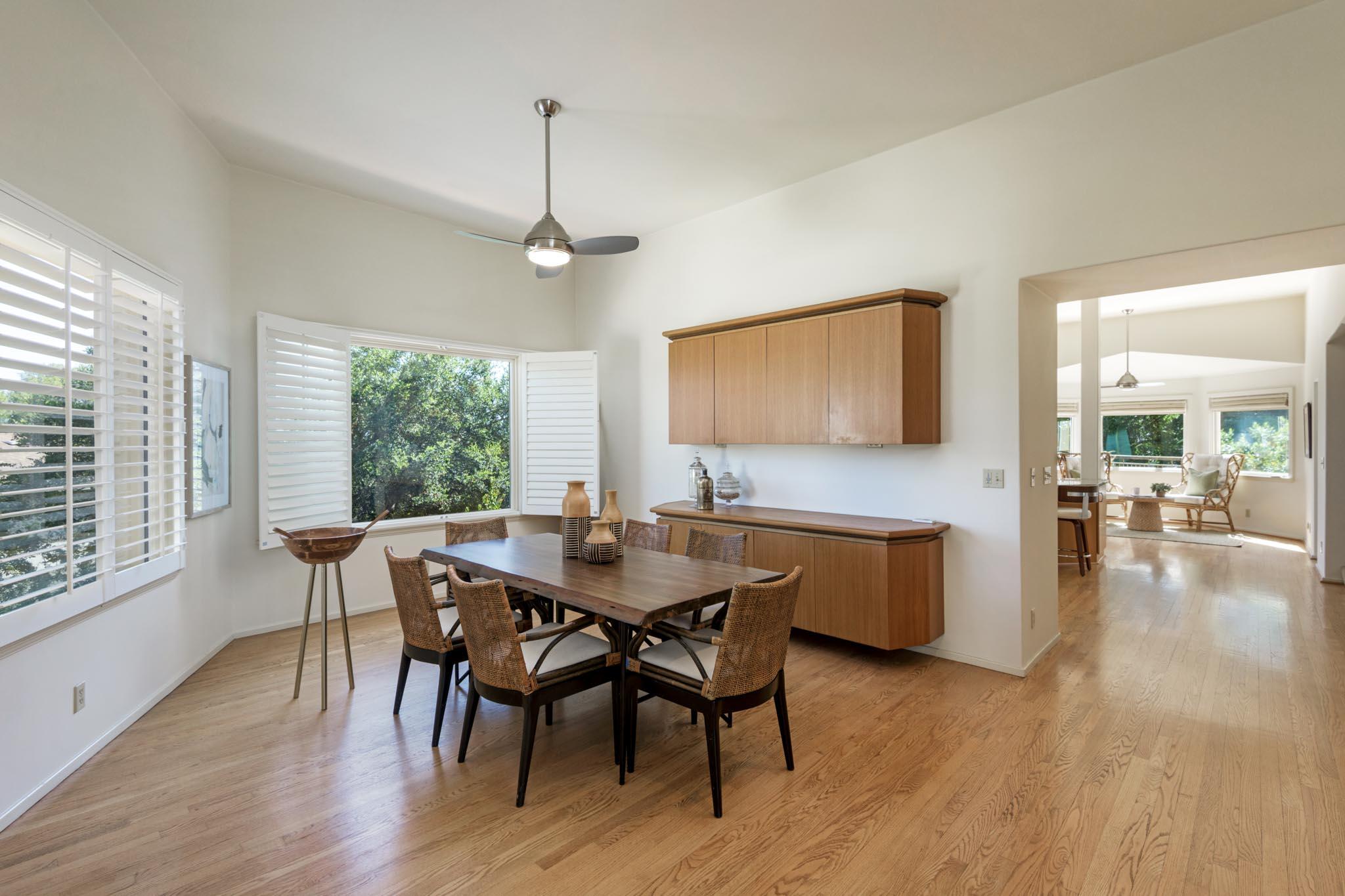 1235 Mission Ridge Road Santa Barbara, CA 93103 - Photo 11 of 27 a view of a dining room with furniture window and wooden floor