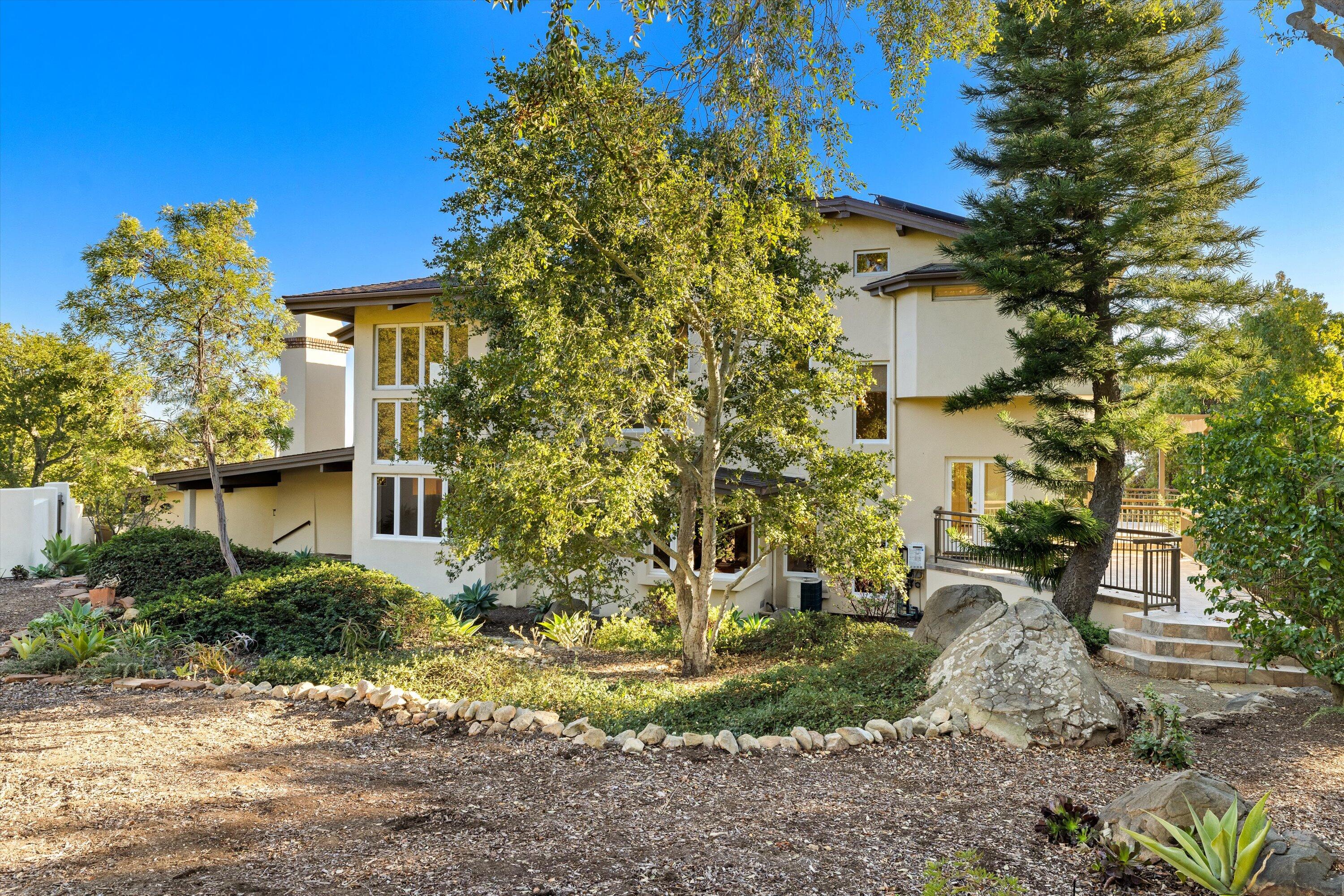 1235 Mission Ridge Road Santa Barbara, CA 93103 - Photo 13 of 27 a view of a house with a yard and tree s