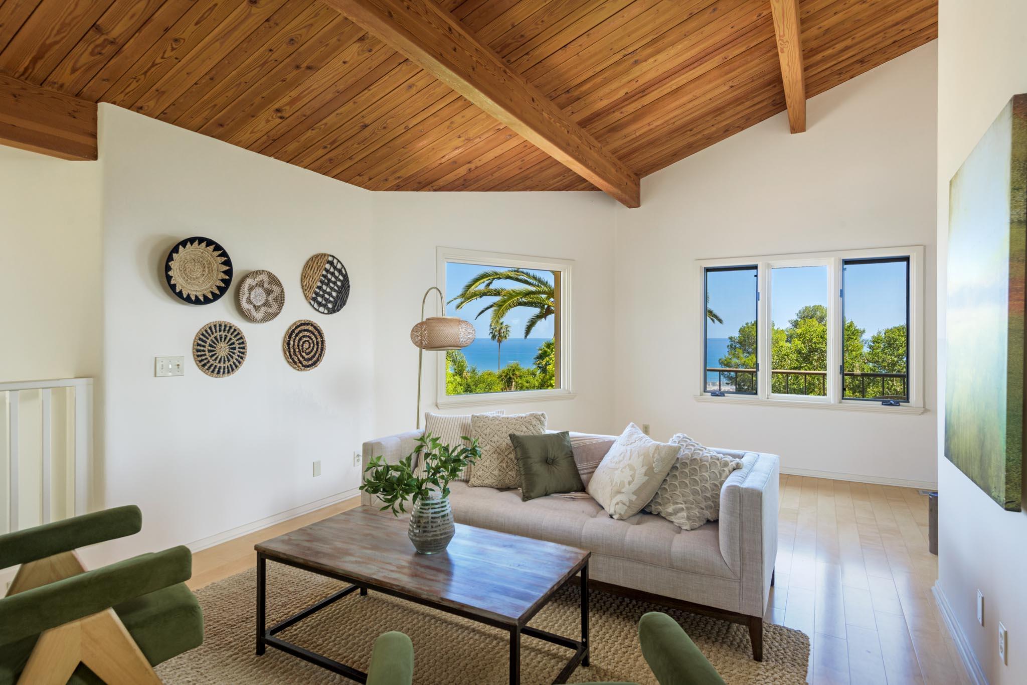 1235 Mission Ridge Road Santa Barbara, CA 93103 - Photo 15 of 27 a living room with furniture and a wooden floor