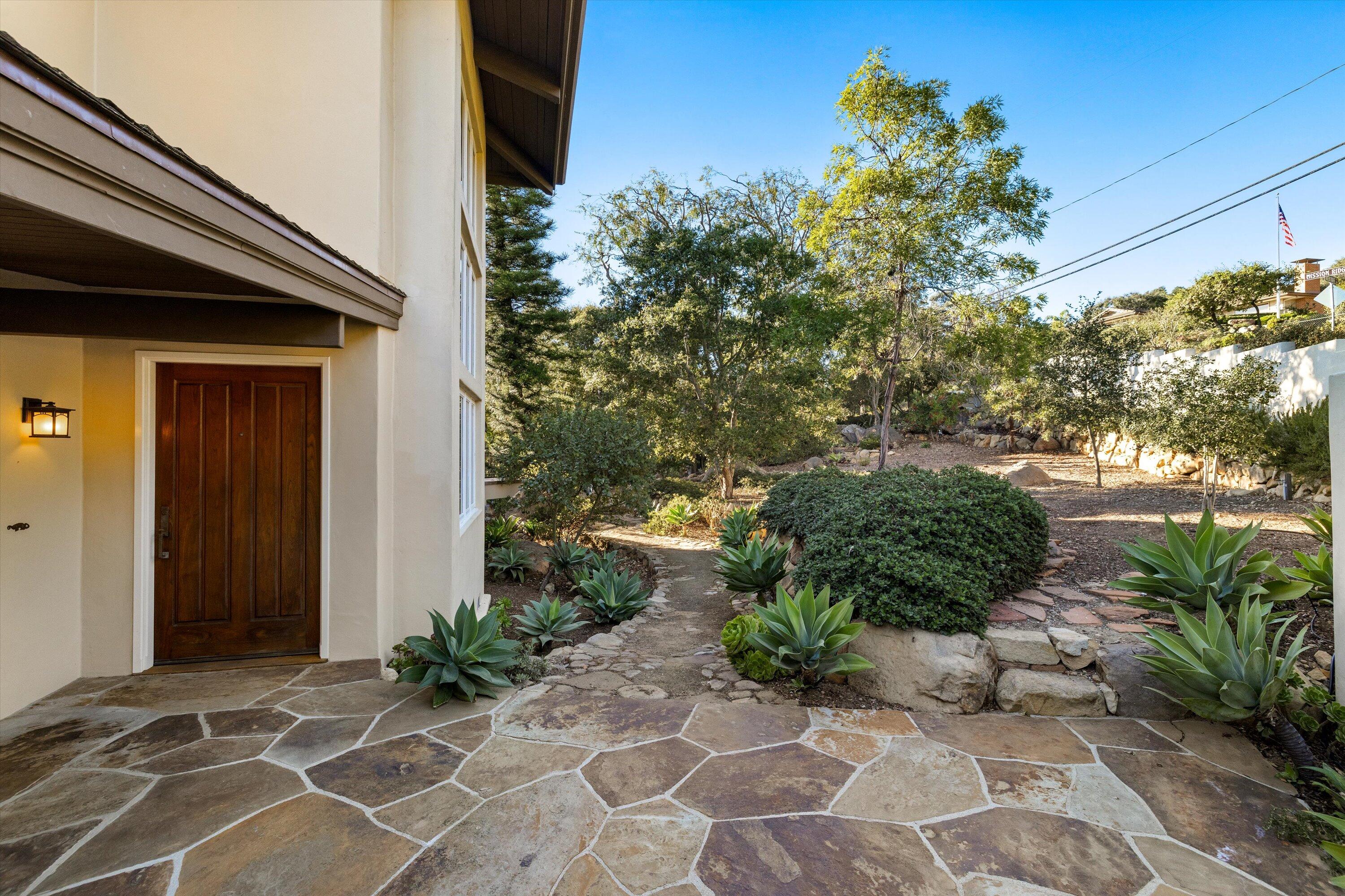 1235 Mission Ridge Road Santa Barbara, CA 93103 - Photo 23 of 27 a view of a backyard of the house